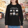 Things I Do In My Spare Time Read Books Buy Books Youth Long Sleeve Tee Things I Do In My Spare Time Read Books Buy Books Youth Long Sleeve Tee