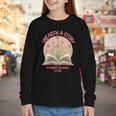 Women's Unearth a Story 2026 Summer Reading Program Flowers Book Youth Long Sleeve Tee Women's Unearth a Story 2026 Summer Reading Program Flowers Book Youth Long Sleeve Tee