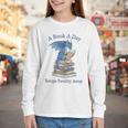A Book A Day Keeps Reality Away Premium Tri-Blend Youth Long Sleeve Tee