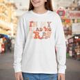 In My Reading Era Groovy Book Lovers Library Reading Women Youth Long Sleeve Tee In My Reading Era Groovy Book Lovers Library Reading Women Youth Long Sleeve Tee