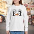 Skeleton Reading Book In Hammock Halloween Reader Youth Long Sleeve Tee