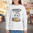 Unearth a Story Cute Dinosaur Summer Reading 2026 Dino Book Youth Long Sleeve Tee