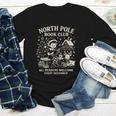 North Pole Book Club Christmas Elf Bookish Retro Graphic Youth Long Sleeve Tee North Pole Book Club Christmas Elf Bookish Retro Graphic Youth Long Sleeve Tee