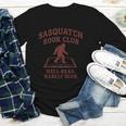 Sasquatch Book Club Bigfoot Reading Cryptid Vintage Youth Long Sleeve Tee Sasquatch Book Club Bigfoot Reading Cryptid Vintage Youth Long Sleeve Tee