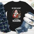 He Sees What You'Ve Been Reading Santa Book Lover Youth Long Sleeve Tee