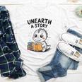 Unearth a Story Cute Dinosaur Summer Reading 2026 Dino Book Youth Long Sleeve Tee