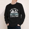 Buying A Book And Getting A Little Treat Youth Long Sleeve Tee