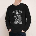 Just One More Chapter Skeleton Reading Book Youth Long Sleeve Tee Just One More Chapter Skeleton Reading Book Youth Long Sleeve Tee