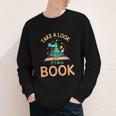 Take a Look It's In a Book Reading Teacher Book Lover Youth Long Sleeve Tee