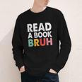 Read A Book Bruh Teacher Youth Long Sleeve Tee