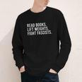 Read Books Lift Weights Fight Fascists Reading Activism Youth Long Sleeve Tee Read Books Lift Weights Fight Fascists Reading Activism Youth Long Sleeve Tee