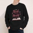 Read Your Heart Out Book Escape Into Stories Youth Long Sleeve Tee Read Your Heart Out Book Escape Into Stories Youth Long Sleeve Tee