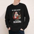 He Sees What You'Ve Been Reading Santa Book Lover Youth Long Sleeve Tee