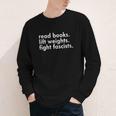 Women's Read Books Lift Weights Fight Fascists Reading Activism Meme Youth Long Sleeve Tee Women's Read Books Lift Weights Fight Fascists Reading Activism Meme Youth Long Sleeve Tee