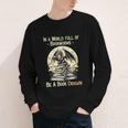 In a World Full Of Bookworms Be a Book Dragon Books Reading Youth Long Sleeve Tee
