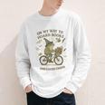 On My Way To Hoard Books And Cause Chaos Tom Foolery Youth Long Sleeve Tee On My Way To Hoard Books And Cause Chaos Tom Foolery Youth Long Sleeve Tee