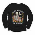 Leave Me Alone Skeleton Reading Book Floral Moon Librarian Youth Long Sleeve Tee