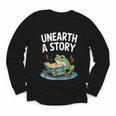 Unearth a Story Frog Reading a Book Summer 2026 Youth Long Sleeve Tee Unearth a Story Frog Reading a Book Summer 2026 Youth Long Sleeve Tee