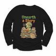 Unearth a Story Triceratops Dinosaur Reading Books Cute Dino Youth Long Sleeve Tee Unearth a Story Triceratops Dinosaur Reading Books Cute Dino Youth Long Sleeve Tee