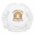 A Book A Day Keeps Reality Away Reading Youth Long Sleeve Tee A Book A Day Keeps Reality Away Reading Youth Long Sleeve Tee