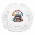 “Books Coffee & Yarn Enthusiast Cozy Reader Youth Long Sleeve Tee “Books Coffee & Yarn Enthusiast Cozy Reader Youth Long Sleeve Tee