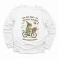 On My Way To Hoard Books And Cause Chaos Tom Foolery Youth Long Sleeve Tee On My Way To Hoard Books And Cause Chaos Tom Foolery Youth Long Sleeve Tee