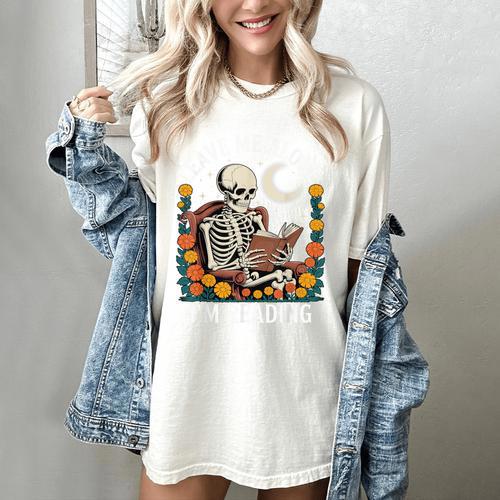 Leave Me Alone Skeleton Reading Book Floral Moon Librarian Women's Comfort Colors T-Shirt - Bookorys
