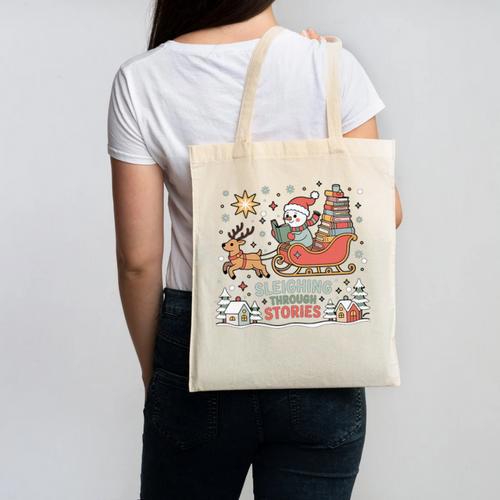 Book Lovers Winter Sleighing Through Stories Tee Premium Tri-Blend Canvas Tote Bag - Bookorys