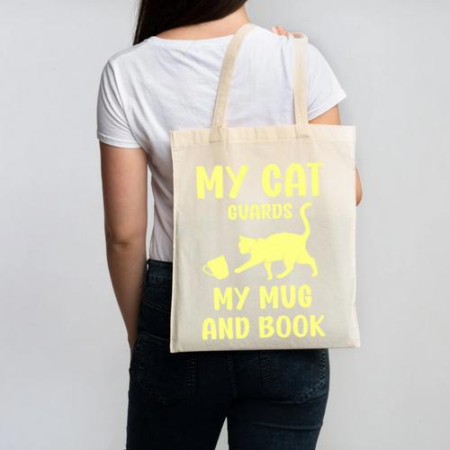My Cat Guards My Mug And Book Humor Cats Premium Tri-Blend Canvas Tote Bag - Bookorys