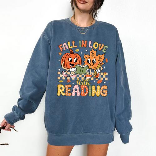 Fall In Love With Reading Autumn Pumpkin Teacher Book Lover Comfort Colors Sweatshirt - Bookorys