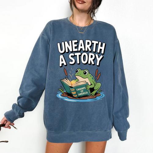 Unearth a Story Frog Reading a Book Summer 2026 Comfort Colors Sweatshirt - Bookorys
