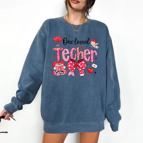 HUGvyn One Loved Teacher Valentine Book Heart Reading Bow Comfort Colors Sweatshirt - Bookorys DE