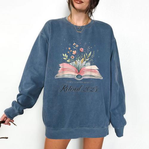 Quote New Chapter Begins Retired 2025 Floral Open Book Comfort Colors Sweatshirt - Bookorys