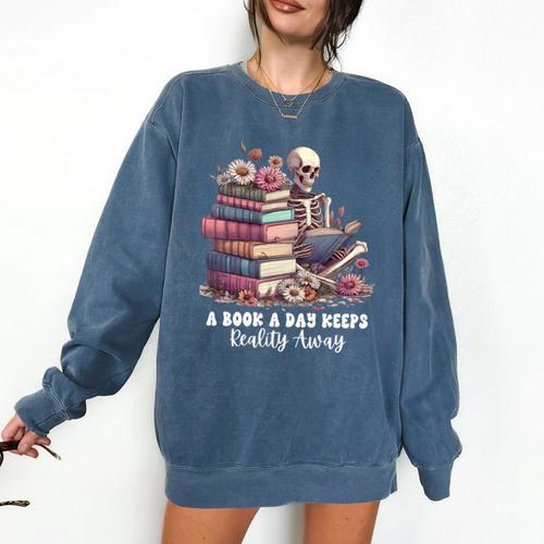 Reading A Book Per Day Keeps Reality Away Skeleton Books Comfort Colors Sweatshirt - Bookorys