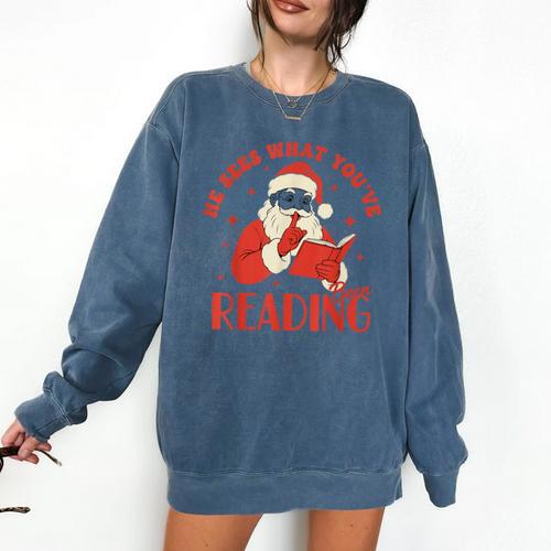 He Sees What You'Ve Been Reading Santa Book Comfort Colors Sweatshirt - Bookorys