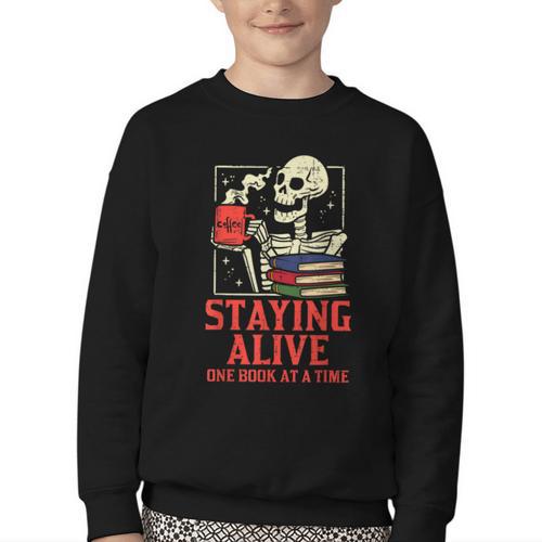Staying Alive One Book At A Time Skeleton Reading Librarian Youth Crewneck Sweatshirt - Bookorys UK