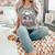 I Buy Her Books And Call Her A Good Girl Skull Rose Bookworm Comfort Colors Tank Top Butter