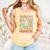 DCC Many Faces Of Mordecai Grid Gamer Series Book Comfort Colors Tank Top Grey DCC Many Faces Of Mordecai Grid Gamer Series Book Comfort Colors Tank Top Grey