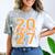 Class Of 2027 Graduation Varsity Orange On The Back Premium Tri-Blend Comfort Color Blast T-Shirt Smoke