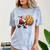 Santa Holding Cookie Xmas Baker Introvert Christmas Comfort Color Blast T-Shirt Ocean