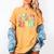 In My Book Keeper Era Librarian School Women's Comfort Colors T-Shirt Mustard