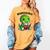 Book Lover Reading Dinosaur Readosaurus Library Women's Comfort Colors T-Shirt Mustard Book Lover Reading Dinosaur Readosaurus Library Women's Comfort Colors T-Shirt Mustard
