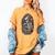 Book Lover Skeleton Reading With Dia De Los Muertos Flowers Women's Comfort Colors T-Shirt Mustard Book Lover Skeleton Reading With Dia De Los Muertos Flowers Women's Comfort Colors T-Shirt Mustard
