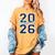 Class Of 2026 Graduation Varsity Navy Blue Letters Premium Tri-Blend Women's Comfort Colors T-Shirt Mustard