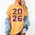 Class Of 2026 Graduation Varsity Purple And Yellow Letters Women's Comfort Colors T-Shirt Mustard