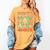 DCC Many Faces Of Mordecai Grid Gamer Series Book Women's Comfort Colors T-Shirt Mustard DCC Many Faces Of Mordecai Grid Gamer Series Book Women's Comfort Colors T-Shirt Mustard