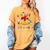 Groovy 100 Days In The Books Reading 100th Day Of School Women's Comfort Colors T-Shirt Mustard