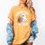 Haunted By My TBR Cute Ghost Book Reading Teacher Halloween Women's Comfort Colors T-Shirt Mustard Haunted By My TBR Cute Ghost Book Reading Teacher Halloween Women's Comfort Colors T-Shirt Mustard