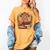 Highland Cow Reading Book Graphic Cow With Book Floral Women's Comfort Colors T-Shirt Mustard Highland Cow Reading Book Graphic Cow With Book Floral Women's Comfort Colors T-Shirt Mustard