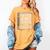Never Judge a Book By Its Cover Women's Comfort Colors T-Shirt Mustard